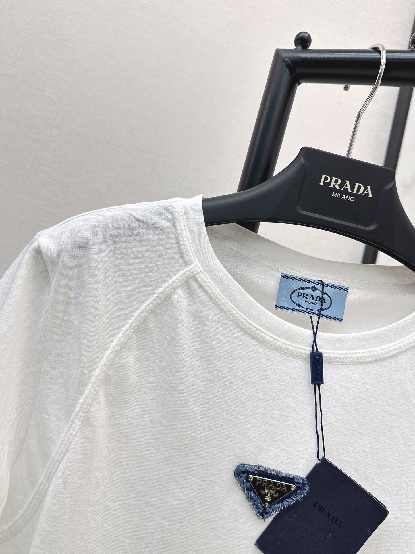 26ss Triangle logo embellished T-shirt