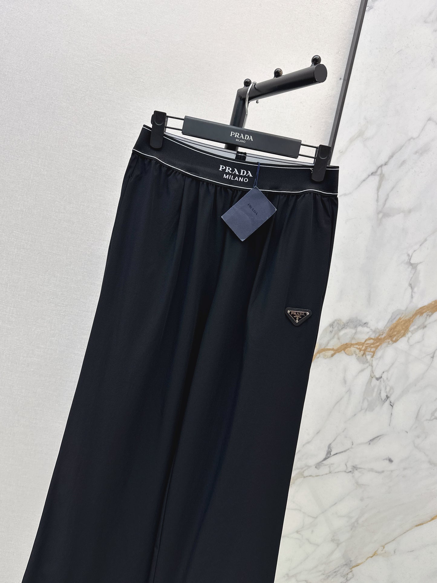 26ss Slim-fit, slightly flared trousers