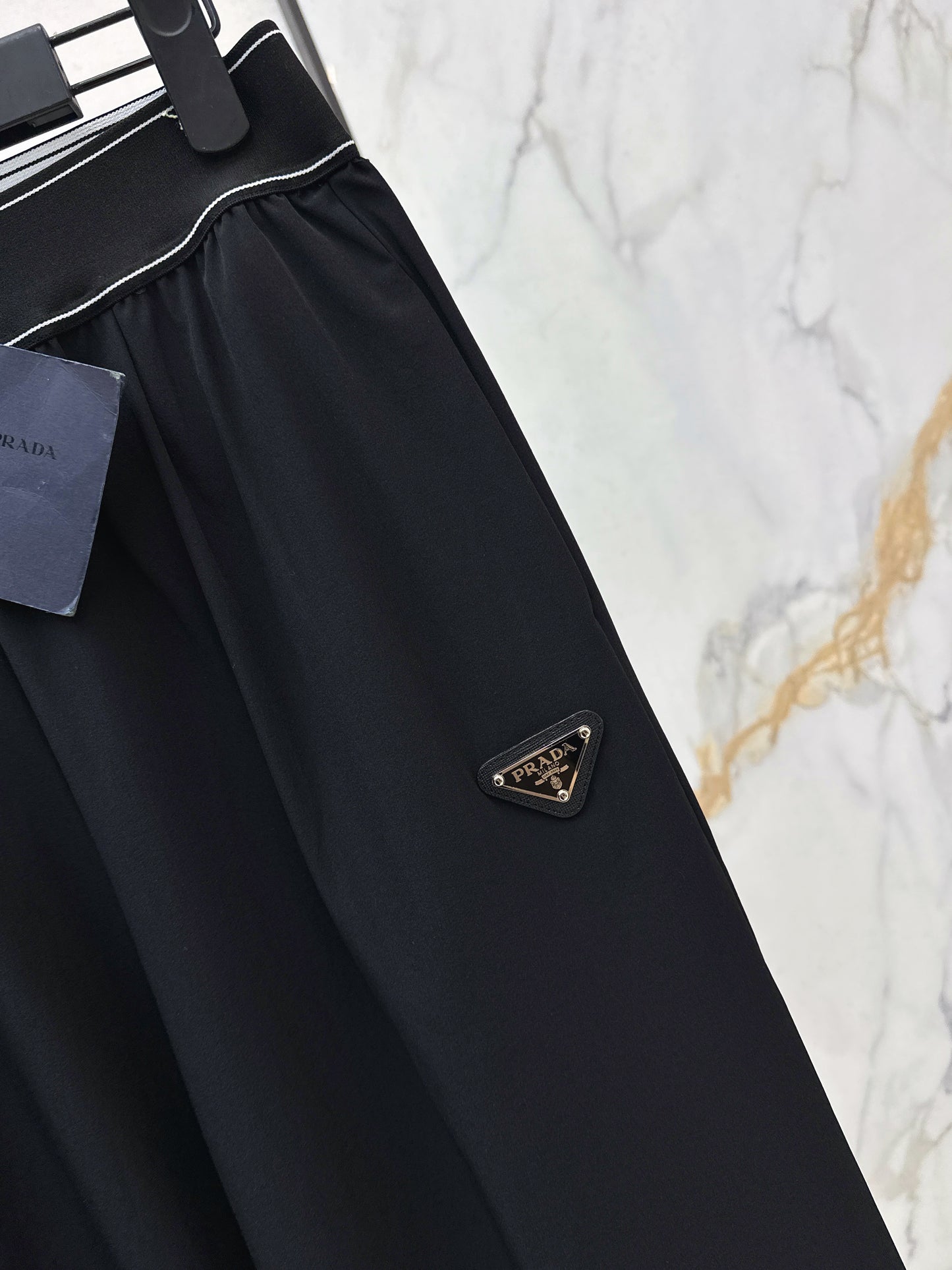26ss Slim-fit, slightly flared trousers