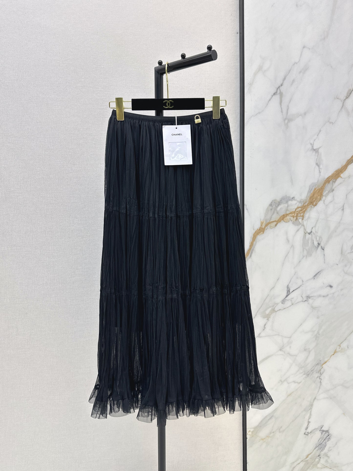 26ss A flowing, tulle-trimmed midi skirt