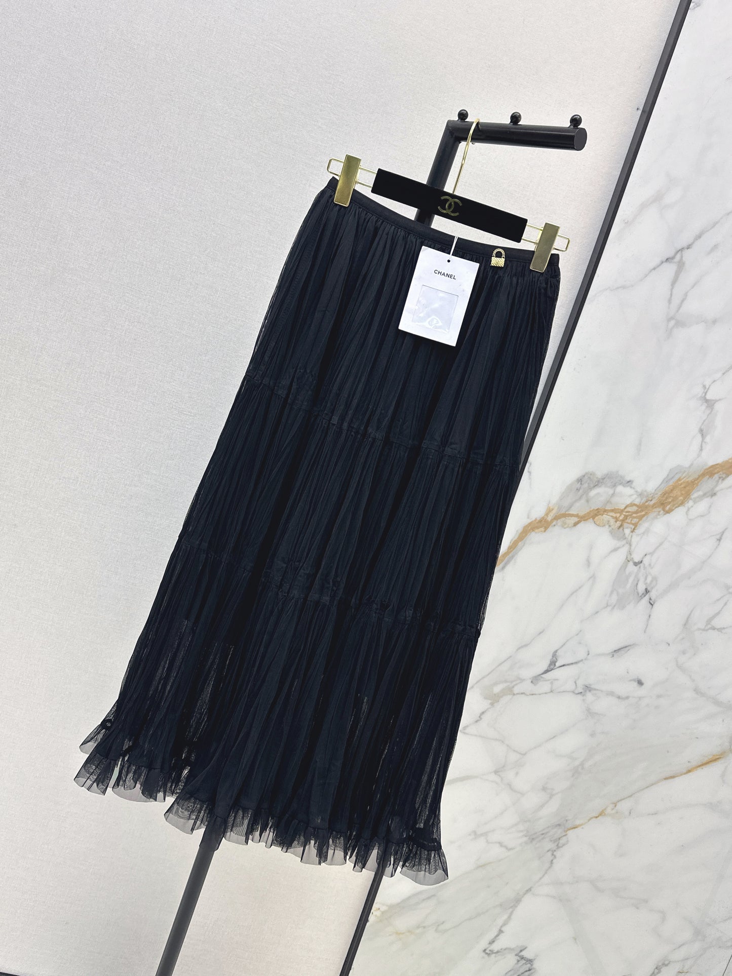 26ss A flowing, tulle-trimmed midi skirt