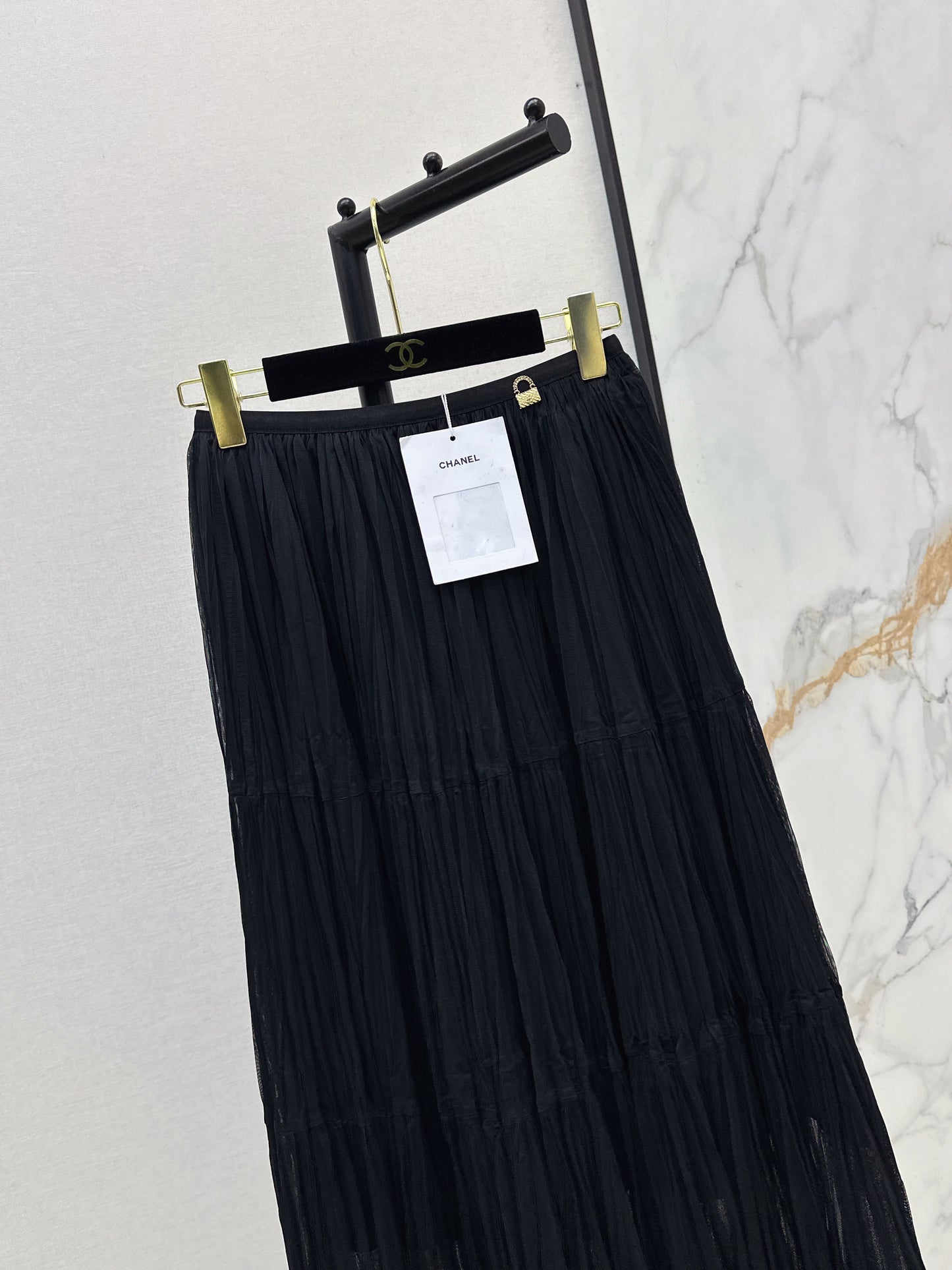 26ss A flowing, tulle-trimmed midi skirt