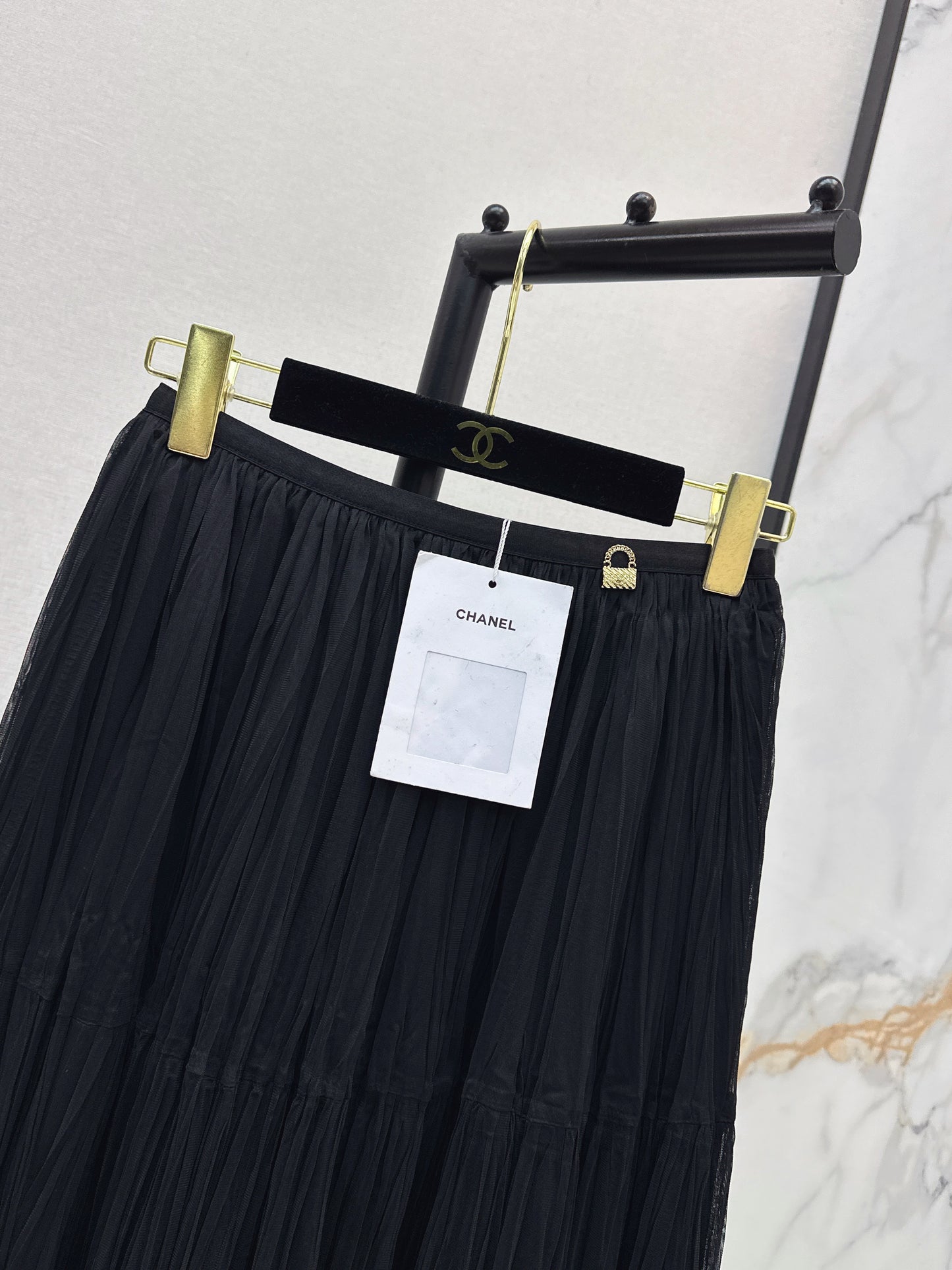 26ss A flowing, tulle-trimmed midi skirt