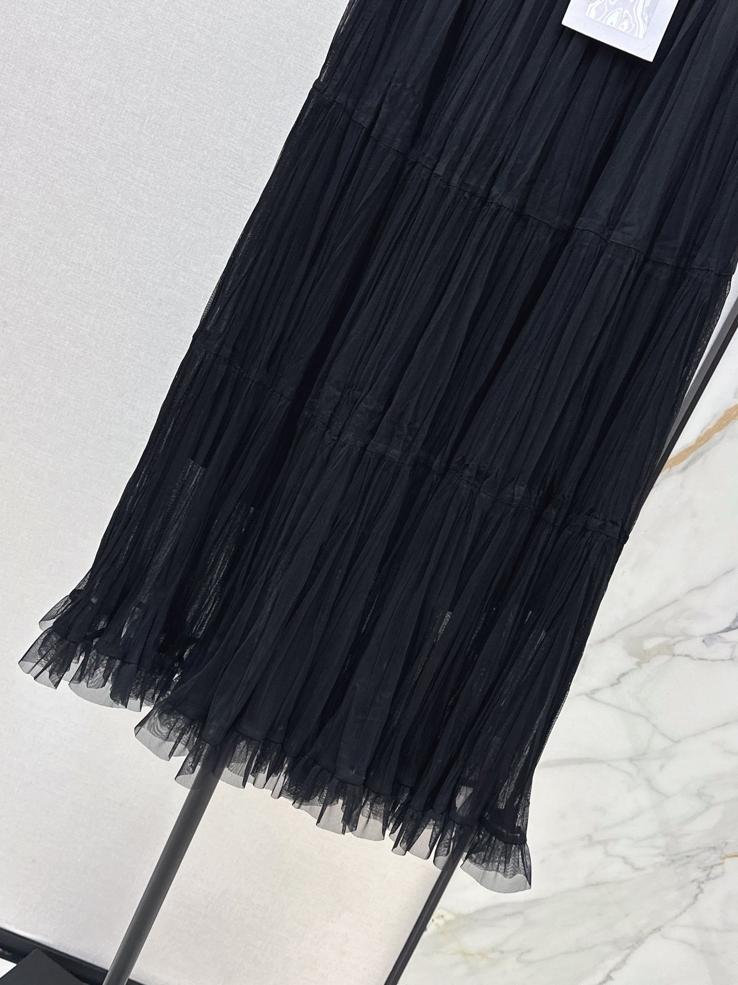 26ss A flowing, tulle-trimmed midi skirt