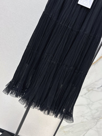 26ss A flowing, tulle-trimmed midi skirt
