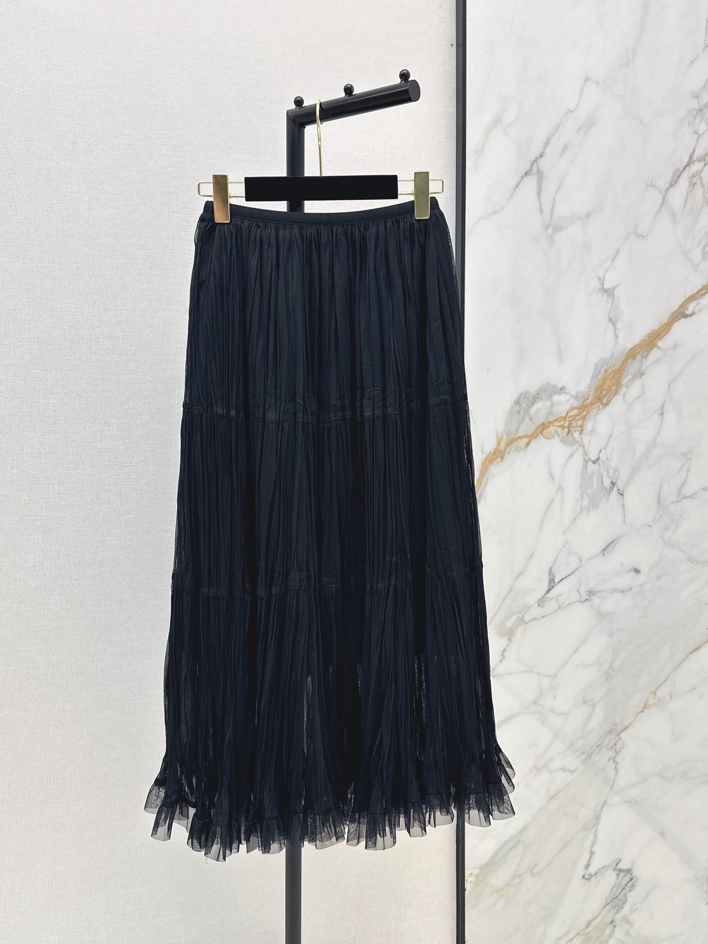 26ss A flowing, tulle-trimmed midi skirt