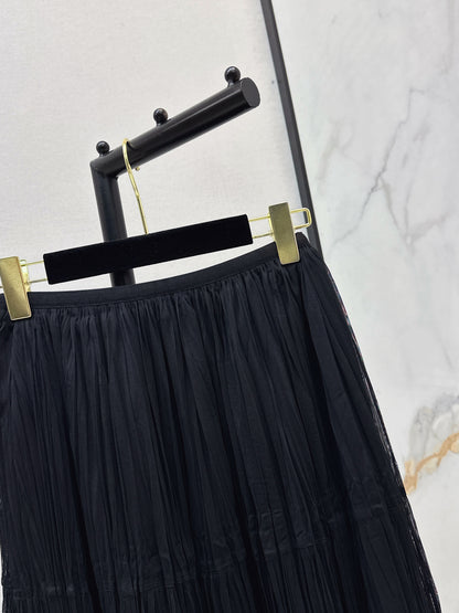 26ss A flowing, tulle-trimmed midi skirt