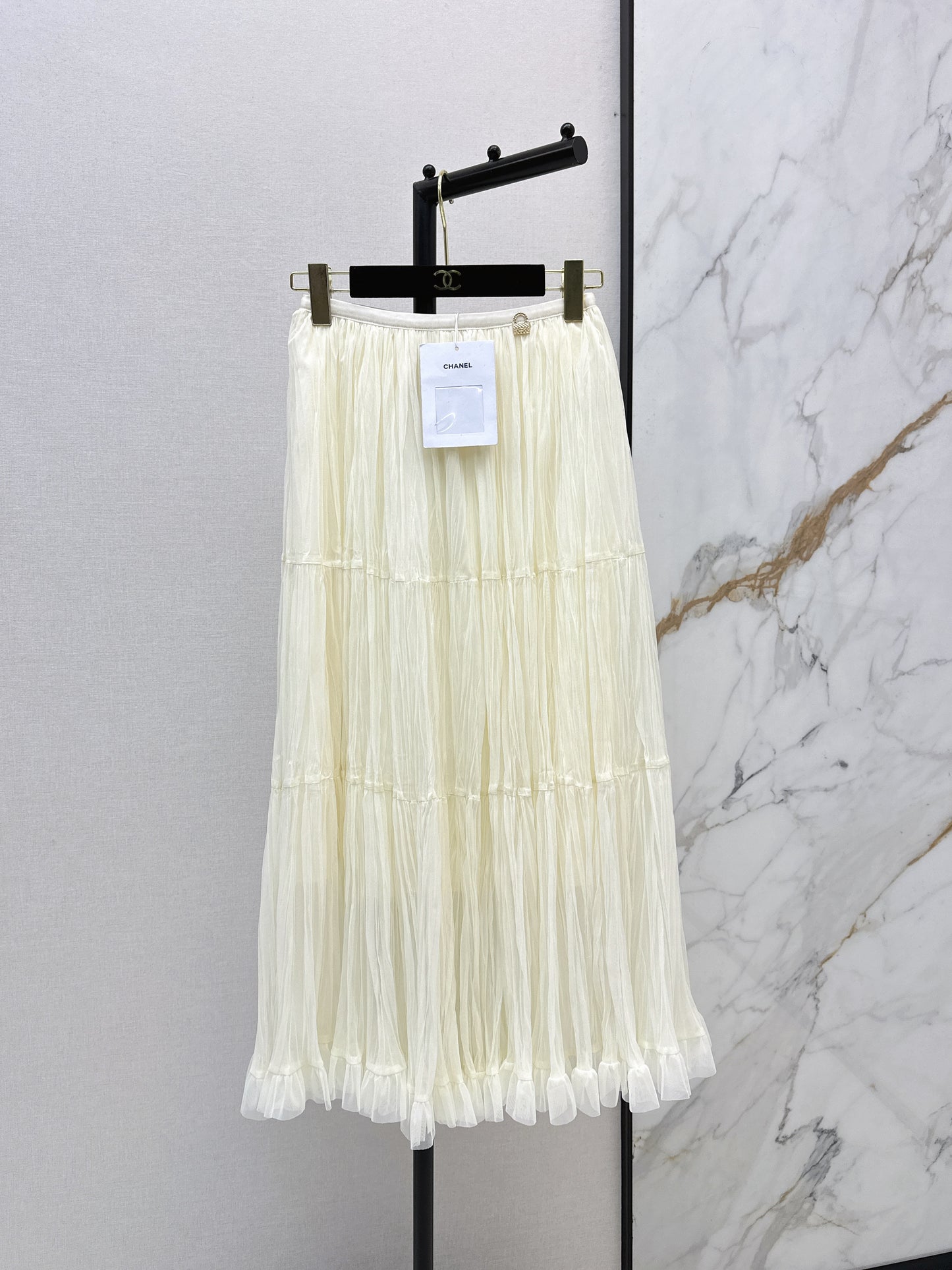 26ss A flowing, tulle-trimmed midi skirt