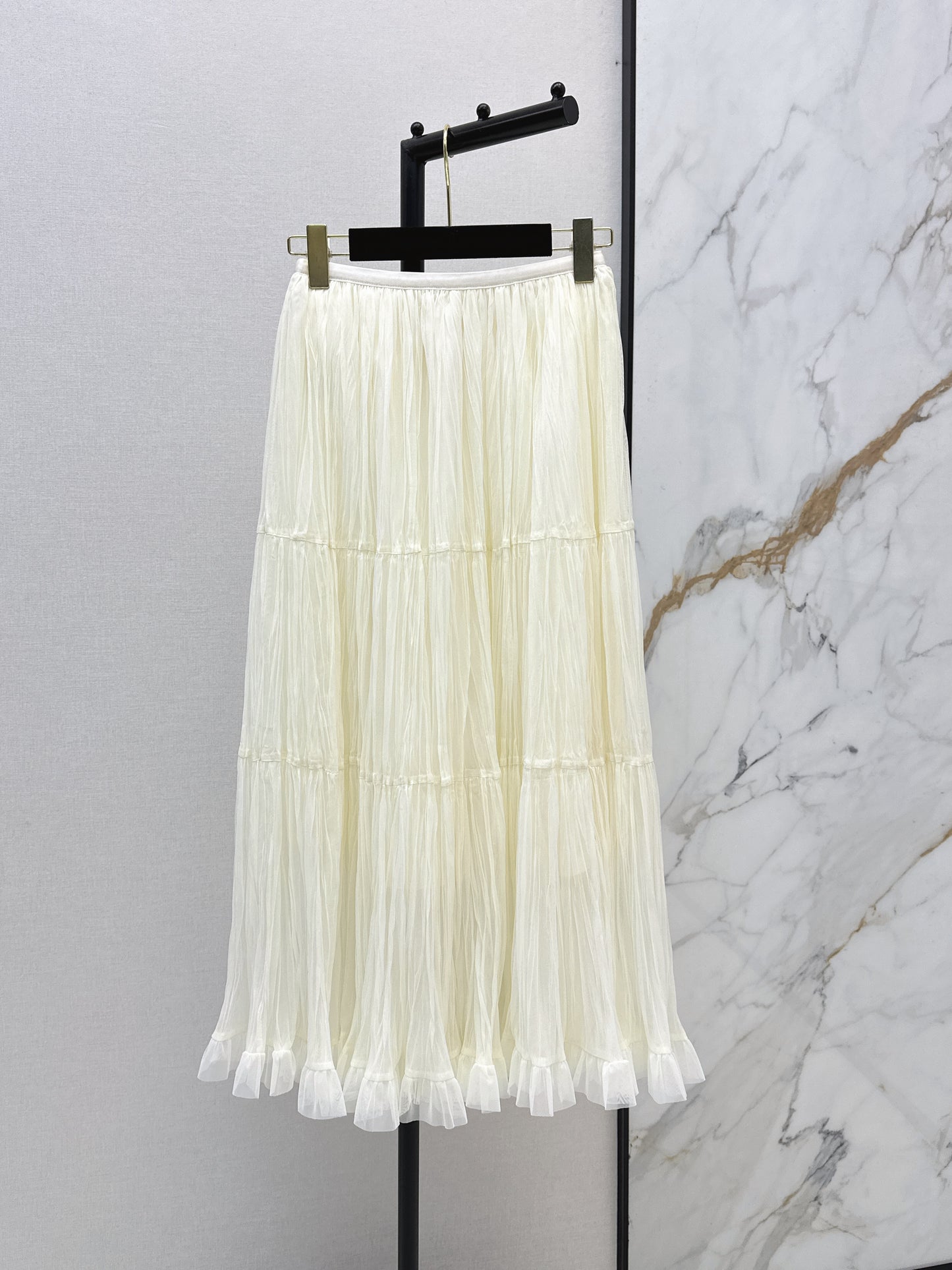 26ss A flowing, tulle-trimmed midi skirt