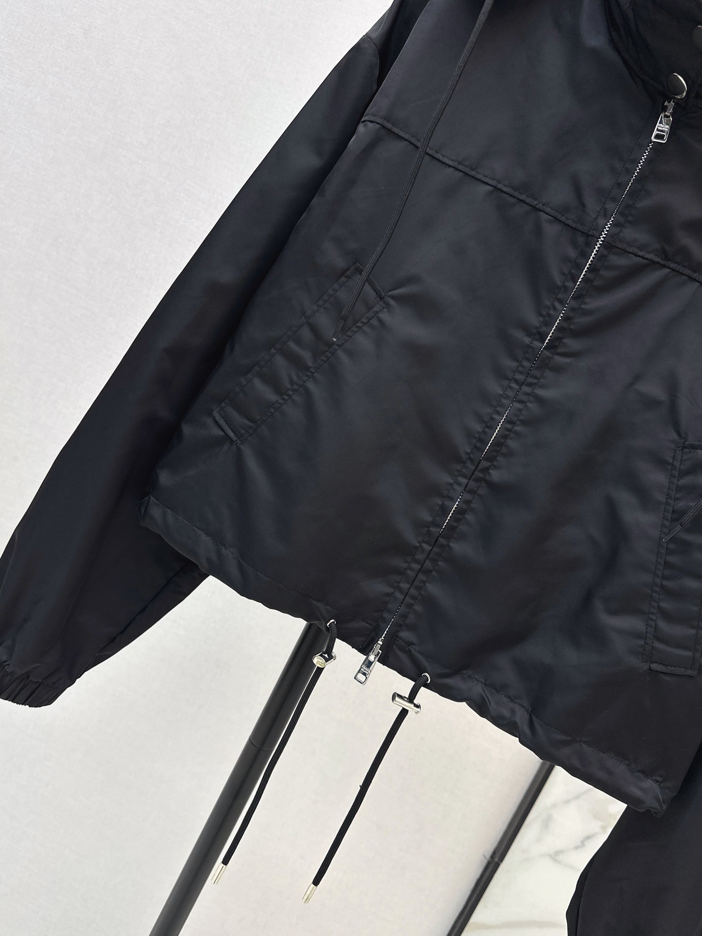26ss Triangle logo hooded nylon jacket