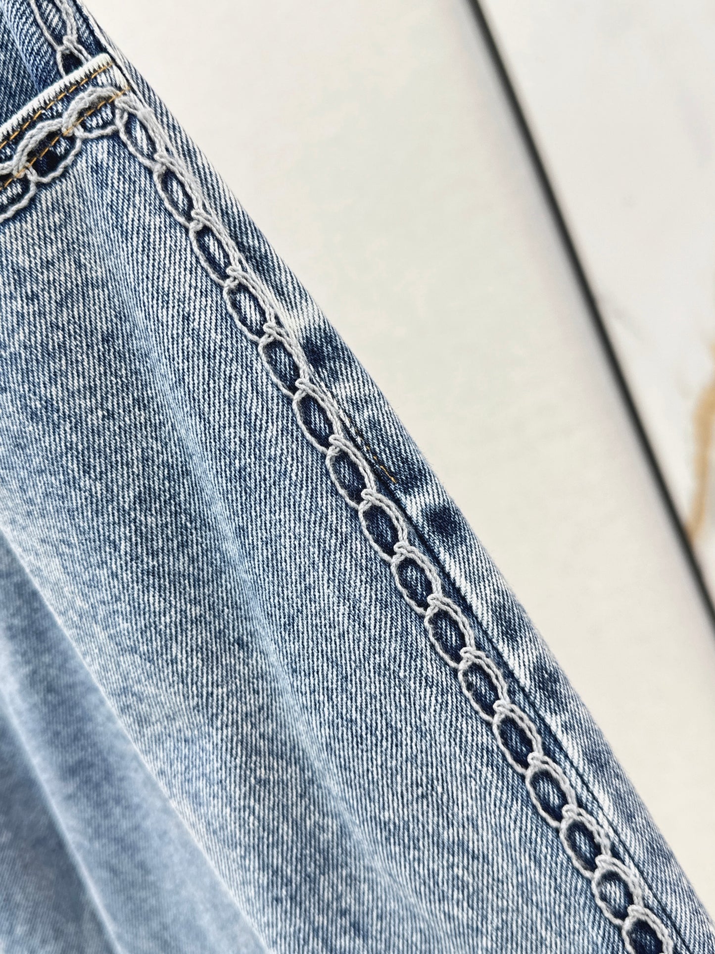 26ss Wide-leg jeans with embroidered cable knit trim