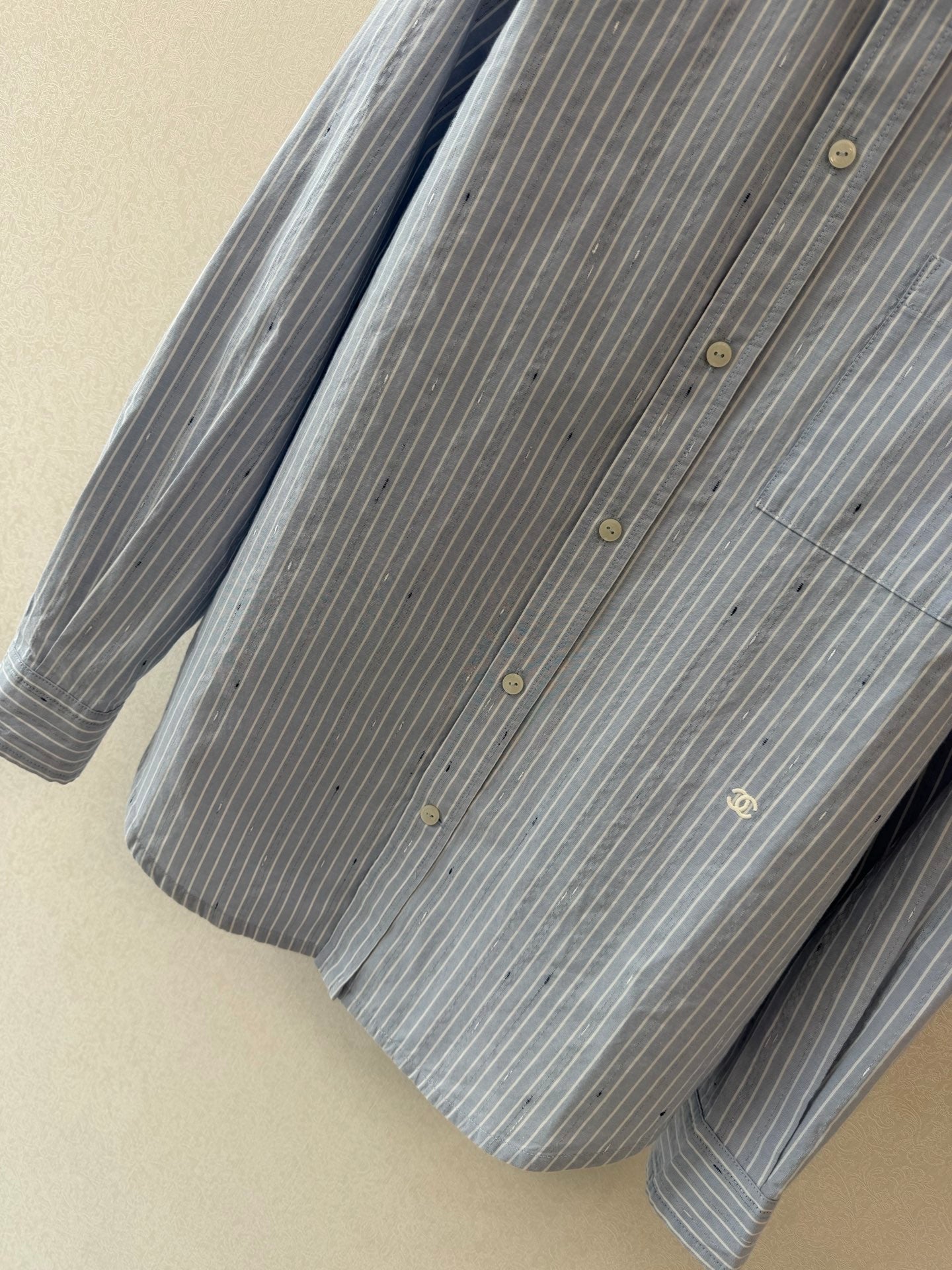 Long vertical-striped shirt