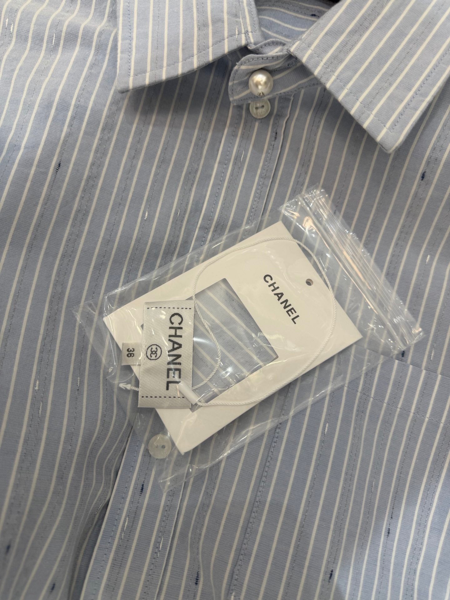 Long vertical-striped shirt