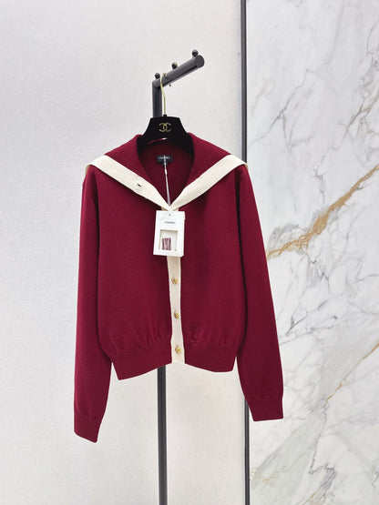 Color-block knit cardigan featuring a nautical-style collar