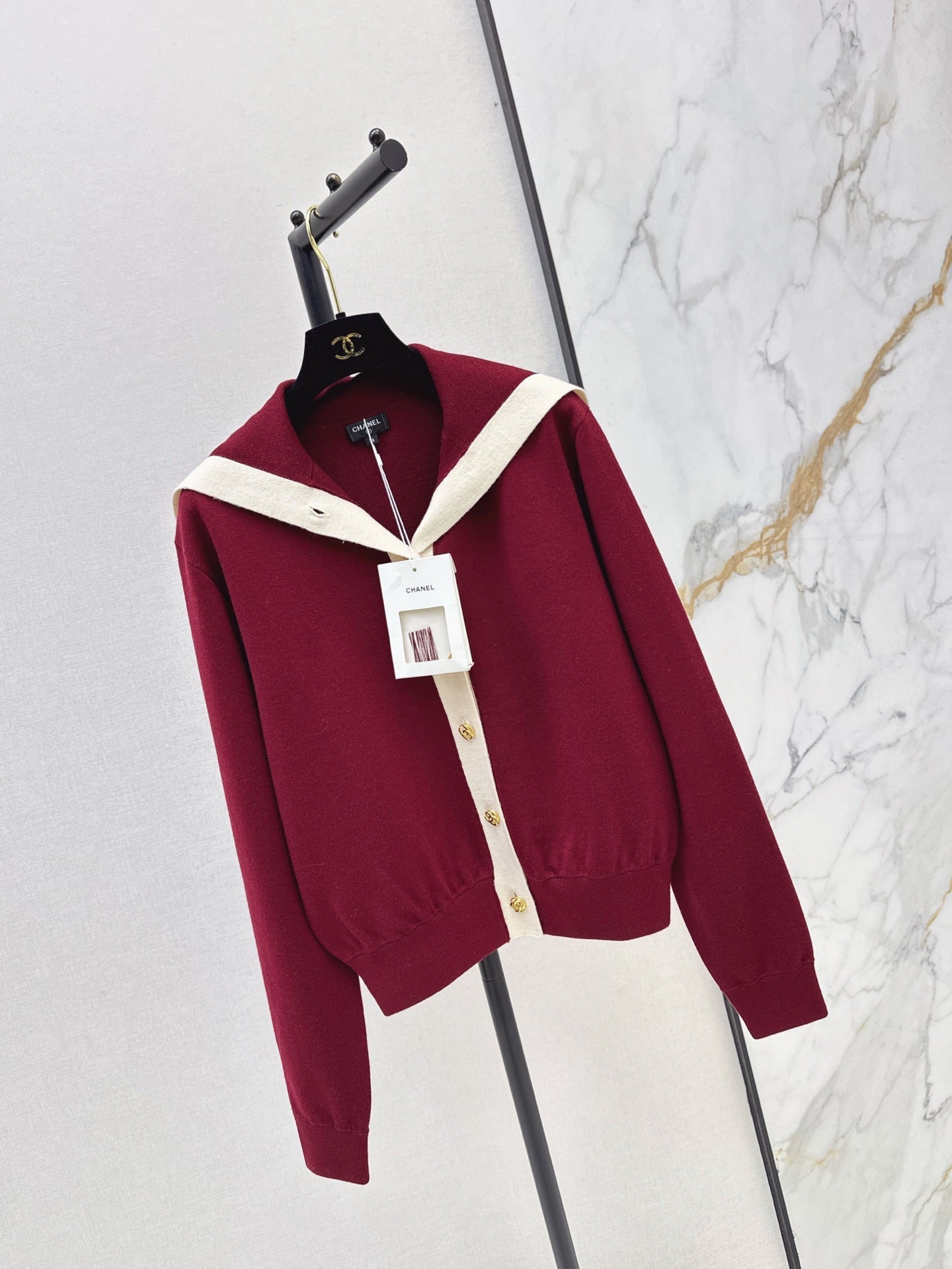 Color-block knit cardigan featuring a nautical-style collar