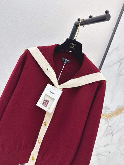 Color-block knit cardigan featuring a nautical-style collar