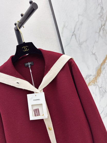 Color-block knit cardigan featuring a nautical-style collar