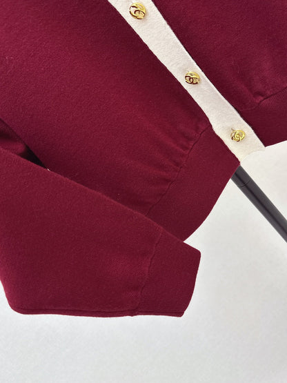 Color-block knit cardigan featuring a nautical-style collar