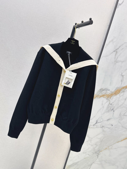 Color-block knit cardigan featuring a nautical-style collar