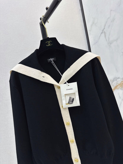Color-block knit cardigan featuring a nautical-style collar