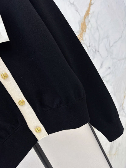 Color-block knit cardigan featuring a nautical-style collar