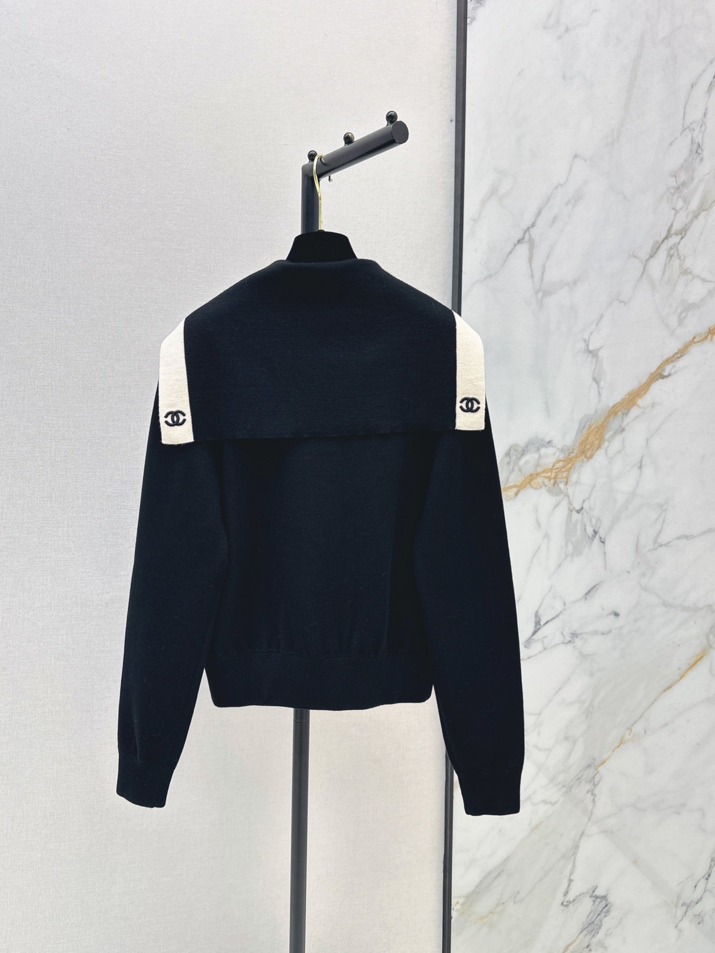 Color-block knit cardigan featuring a nautical-style collar