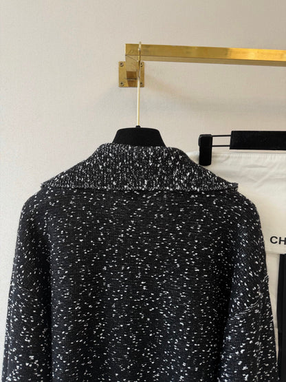 Solid-color long-sleeve knit top with a collar