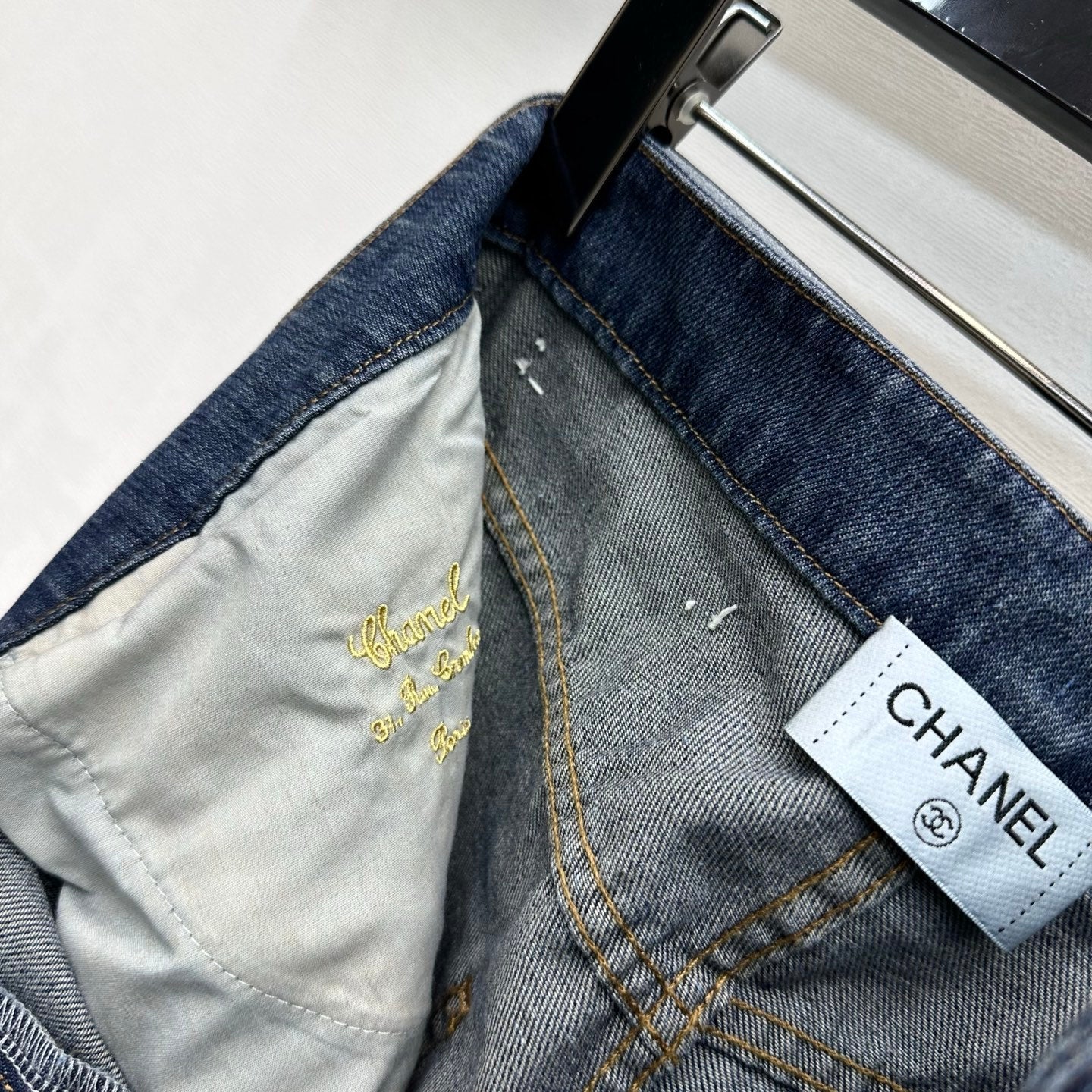 Leather-Patch Bootcut Denim Trousers