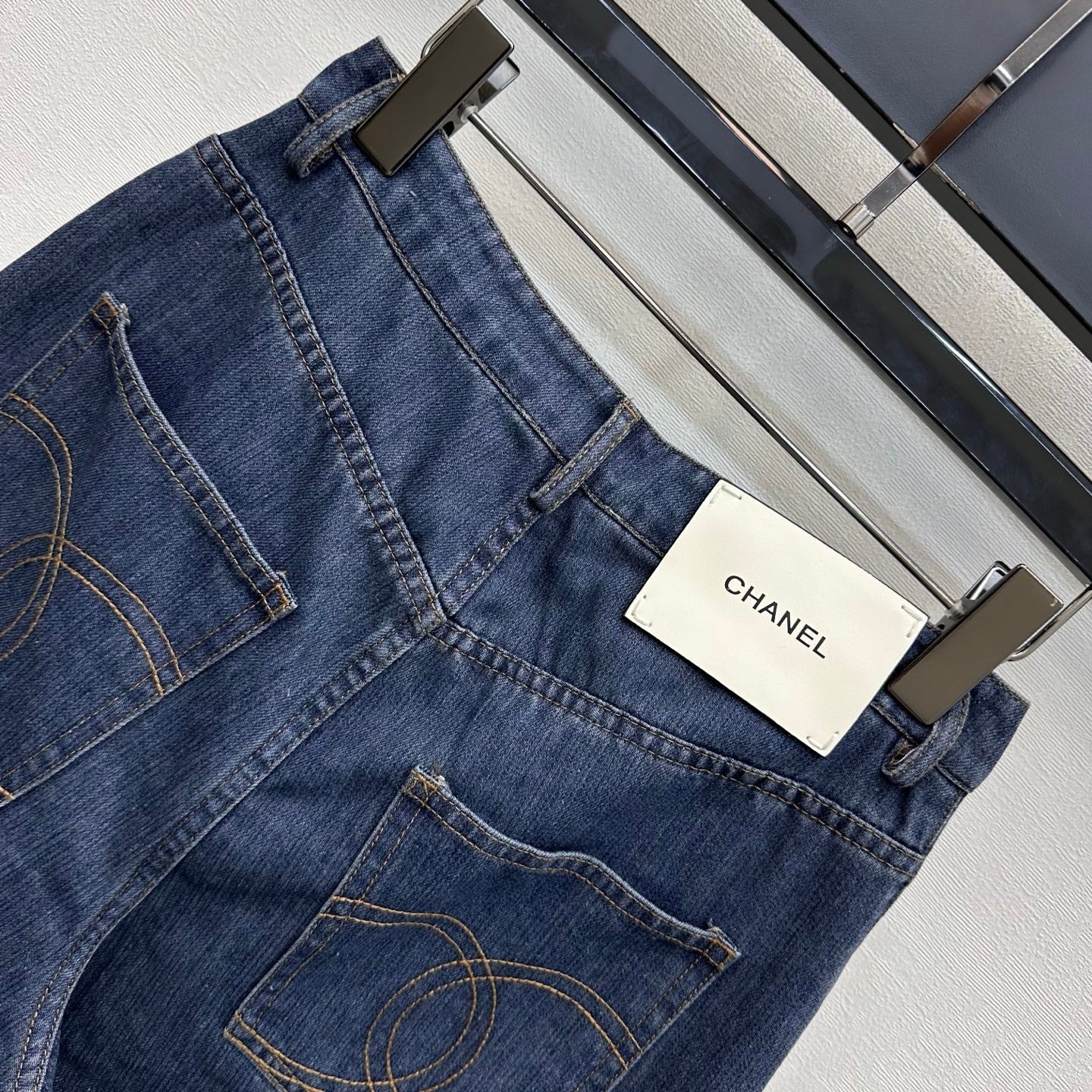 Leather-Patch Bootcut Denim Trousers