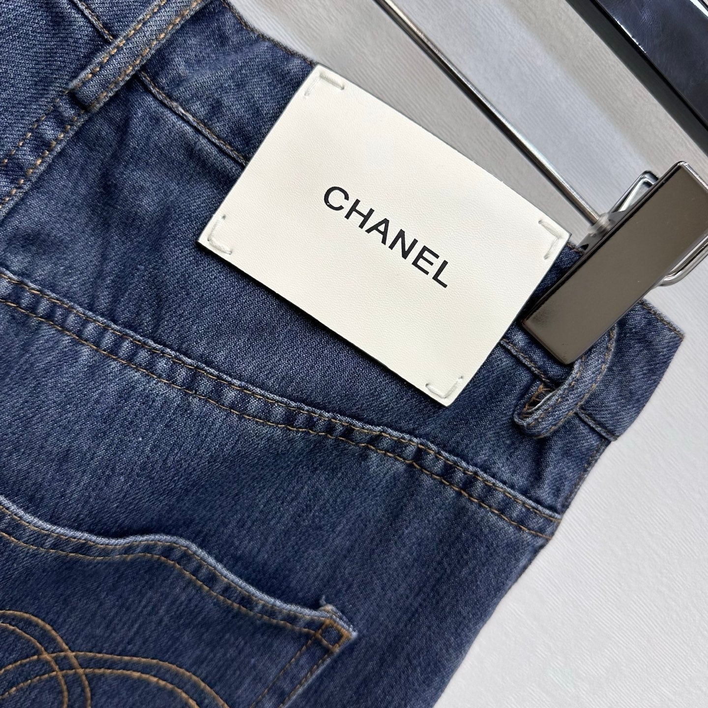 Leather-Patch Bootcut Denim Trousers