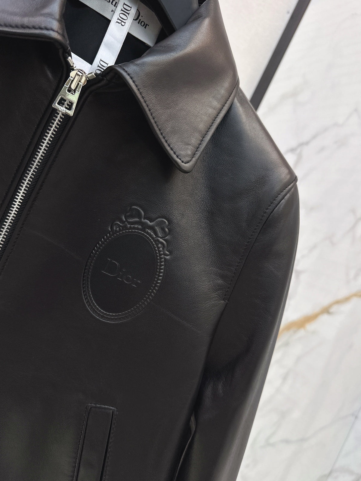 26Latest Autumn/Winter Leather Jacket with Lapel and Embossed Logo Detail