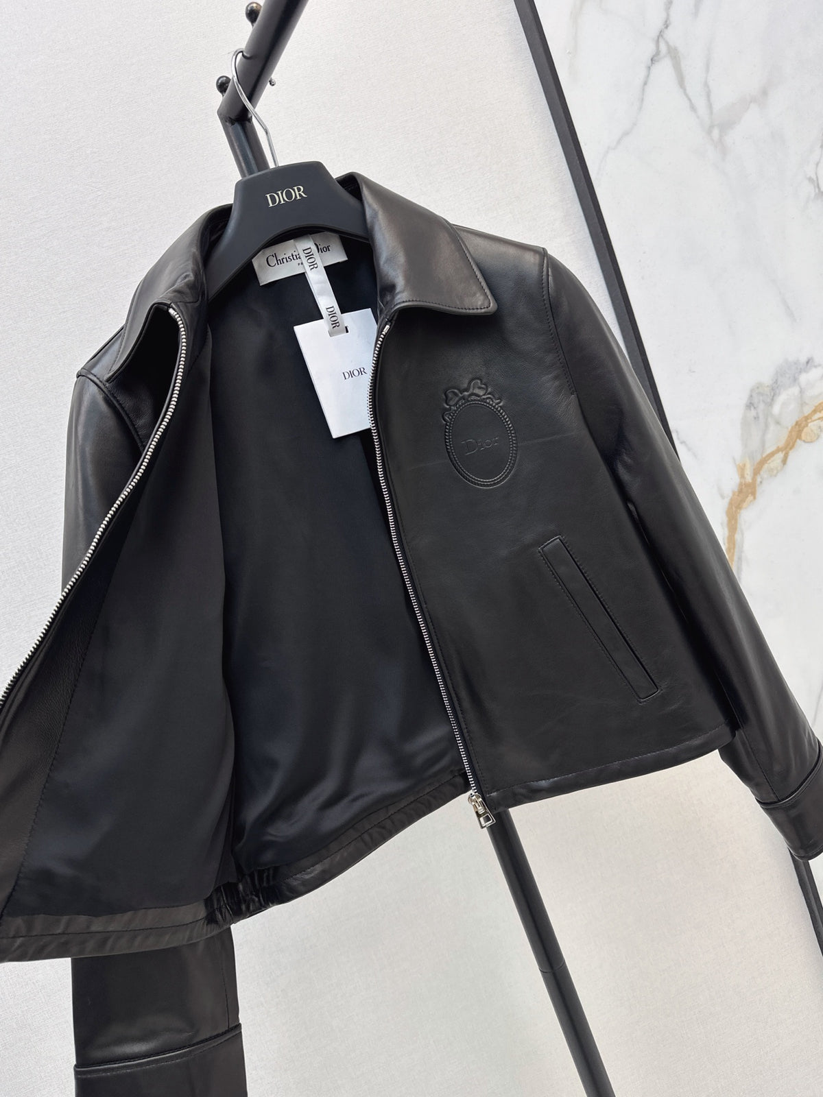 26Latest Autumn/Winter Leather Jacket with Lapel and Embossed Logo Detail