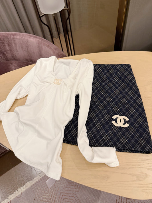 26"Chanel-inspired" style set: fleece-lined top with knotted detailing paired with a plaid A-line mini skirt.