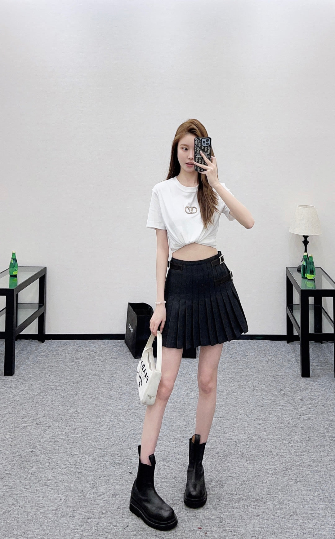 High-waisted pleated mini skirt