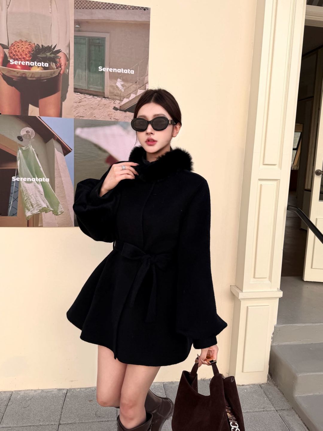 Mid-length coat with fox fur trim