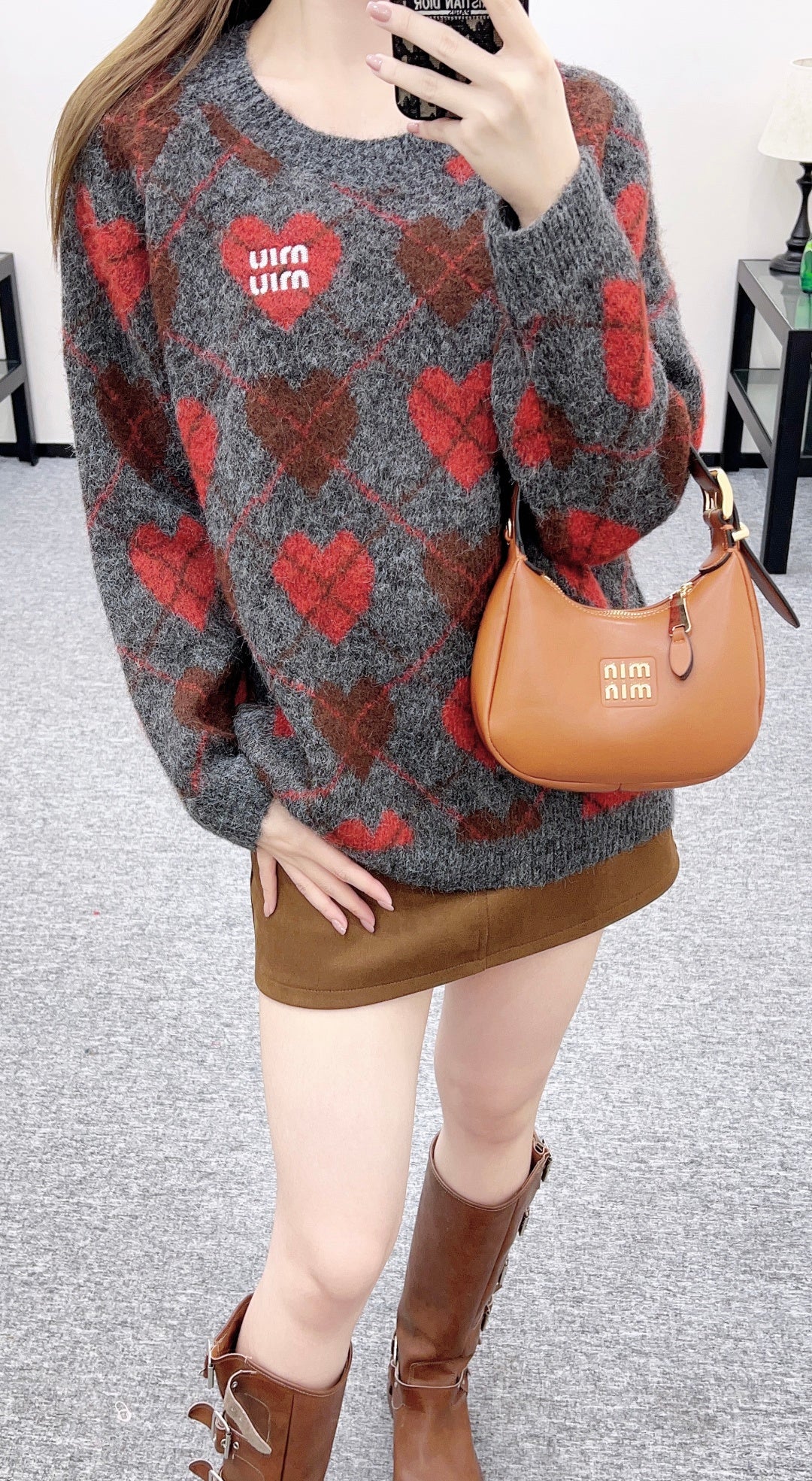 Heart-patterned plaid sweater