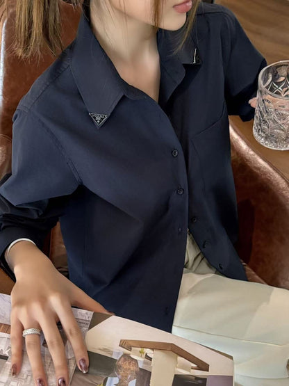 Triangle logo loose-fitting shirt