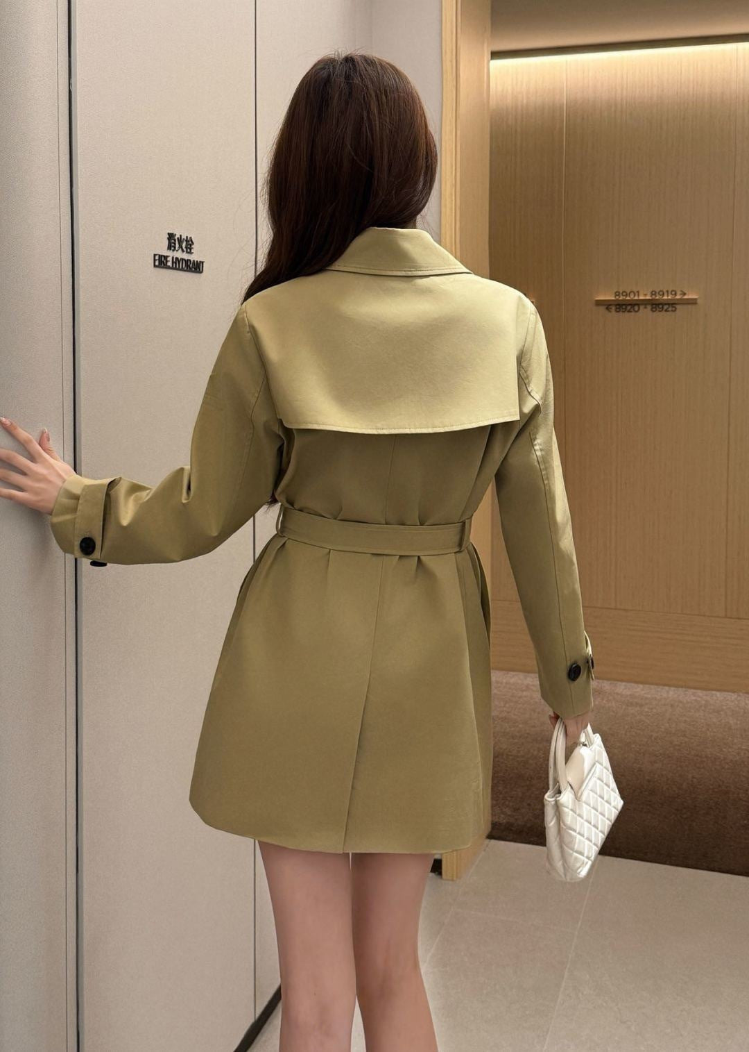 Mid-length, lapel trench coat