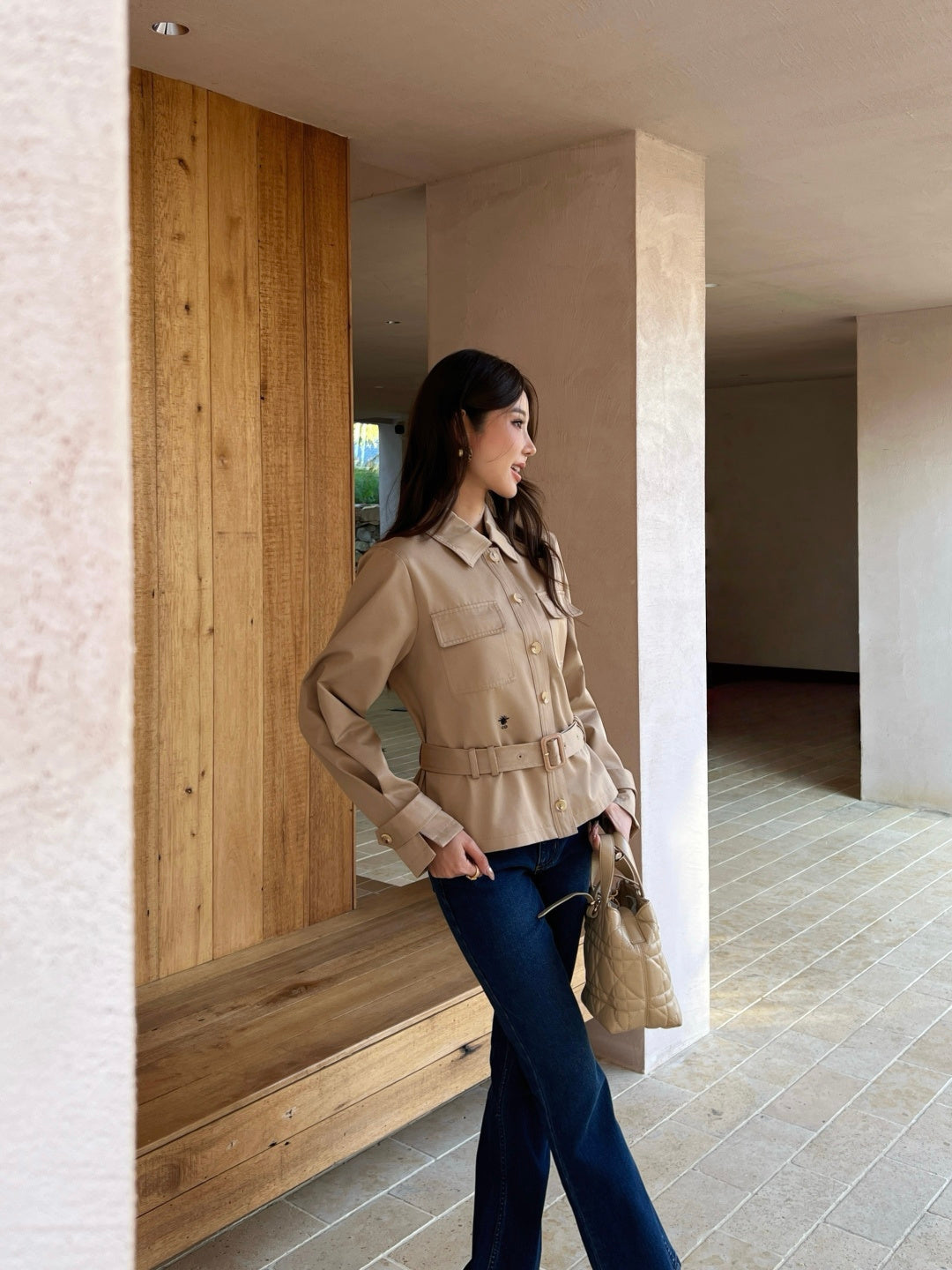 Waist-cinching trench coat