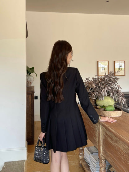 Double-breasted pleated dress