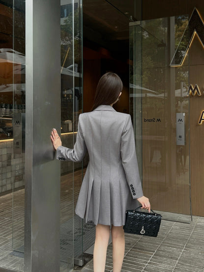 Double-breasted pleated dress
