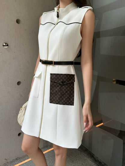 Sleeveless dress with pocket appliqué
