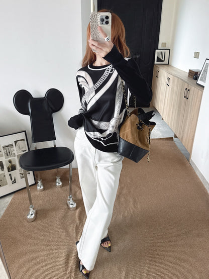 Patterned patchwork knit sweater