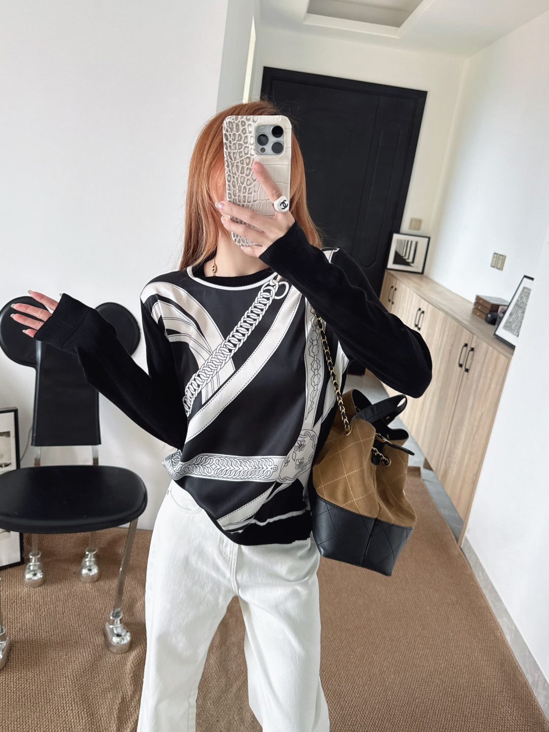Patterned patchwork knit sweater