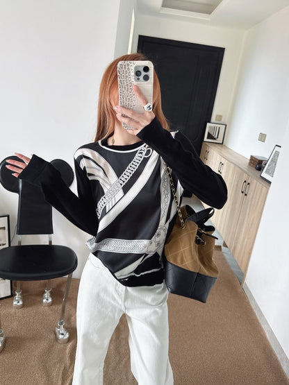 Patterned patchwork knit sweater