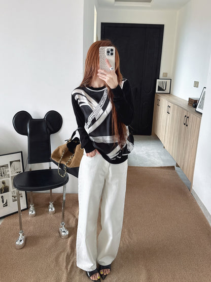 Patterned patchwork knit sweater