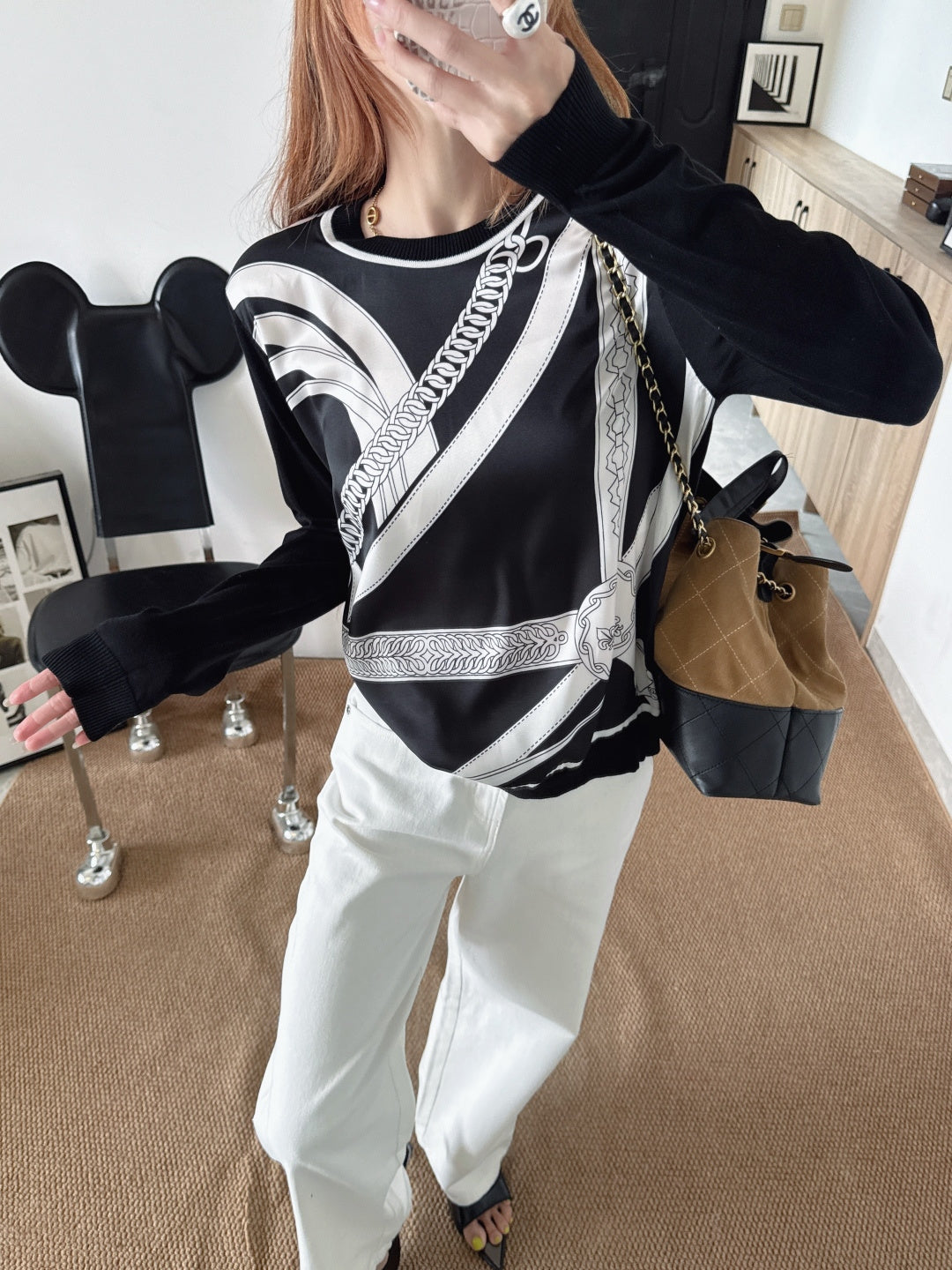 Patterned patchwork knit sweater