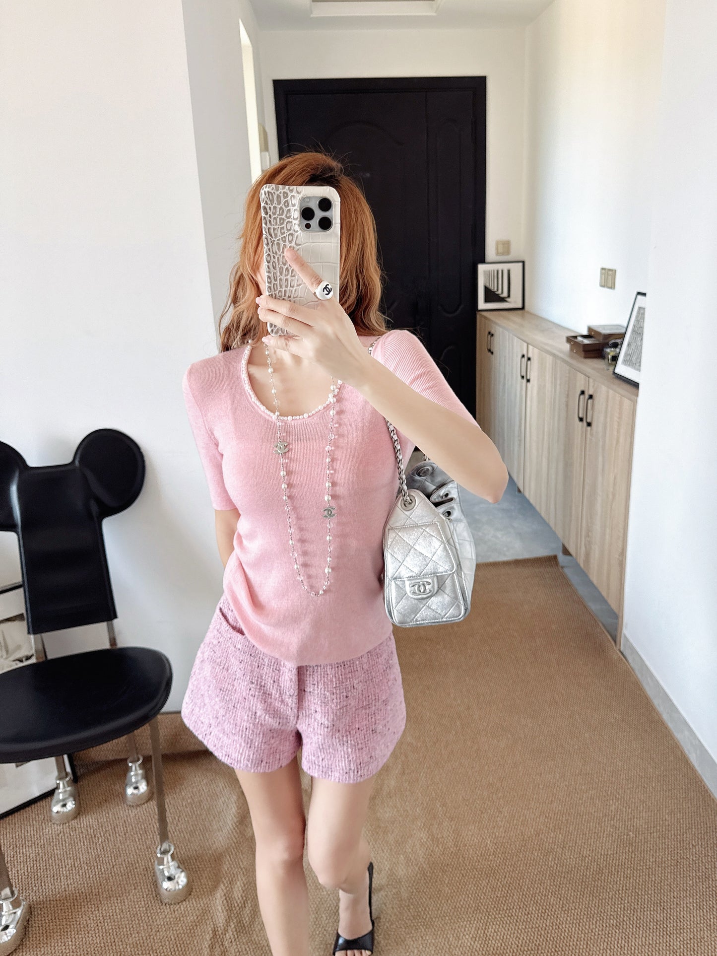 Pearl embellishments on a short-sleeved top