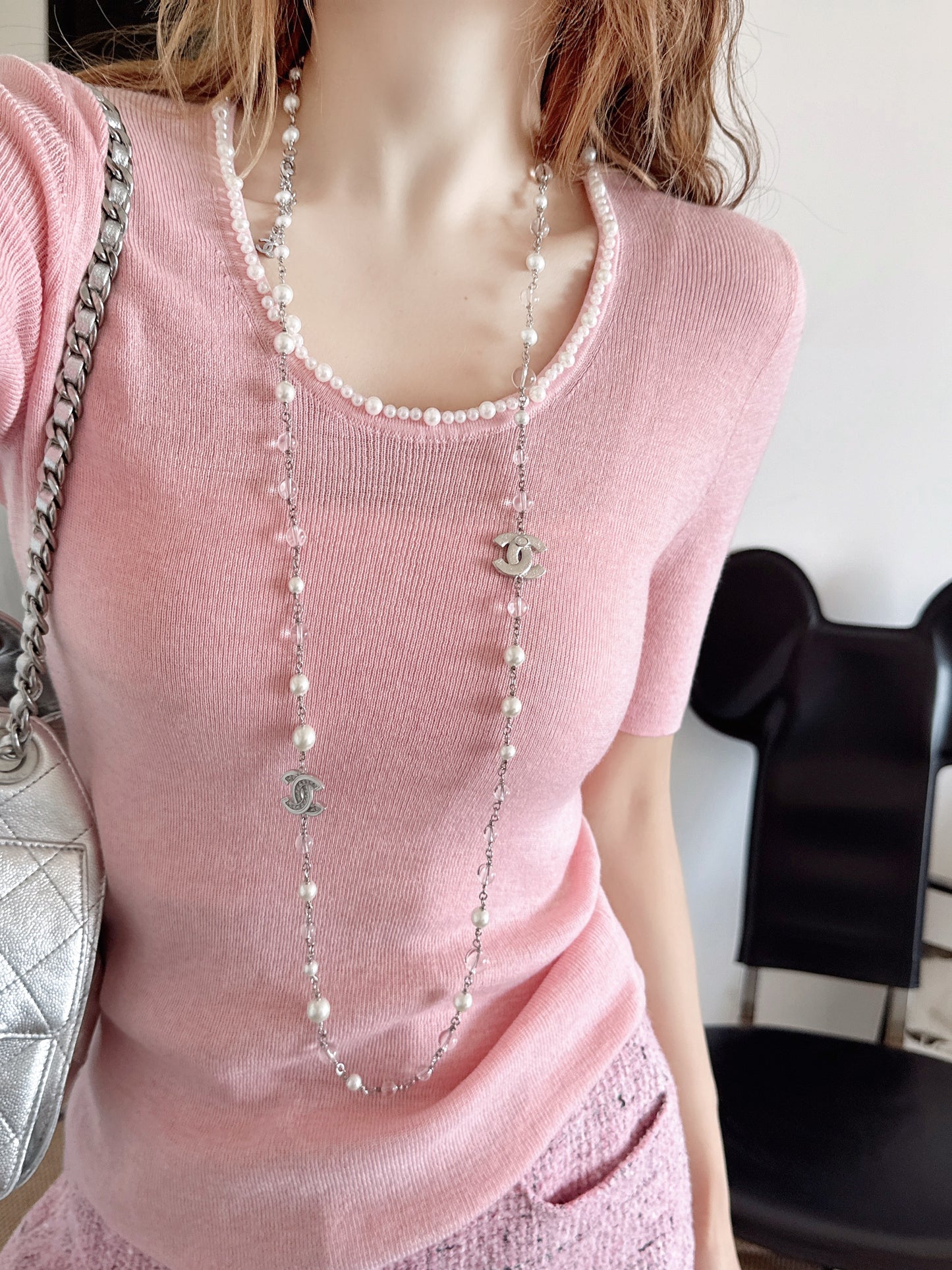Pearl embellishments on a short-sleeved top