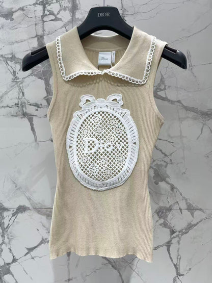 Open-knit vest with a Peter Pan collar